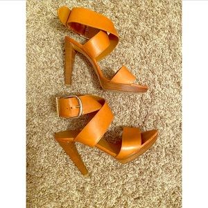 Gold buckled Balenciaga pumps